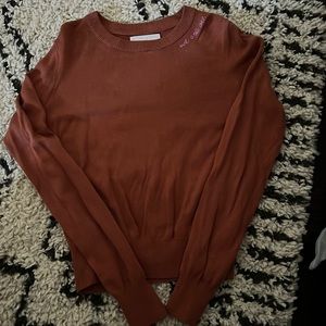 Spiritual gangster mauve like color sweater. Thin. Size small. Worn once